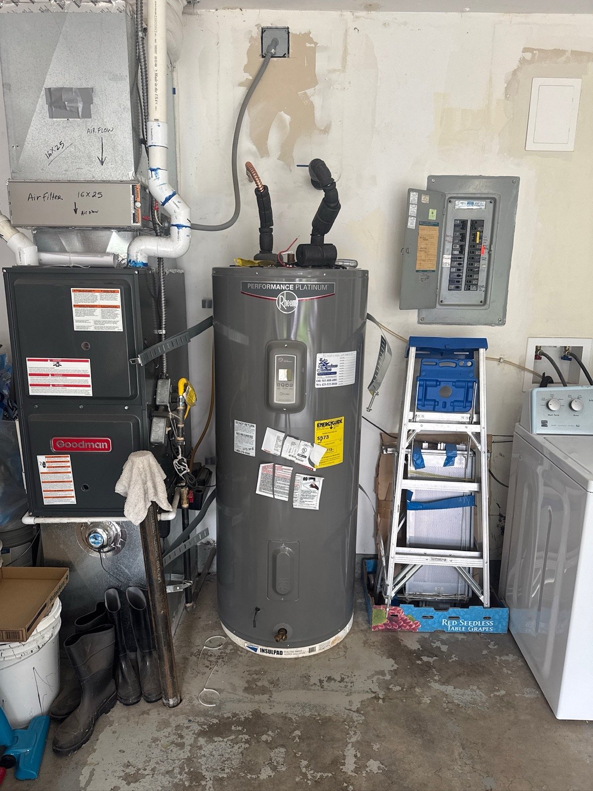Aging Rheem Performance Platinum electric water heater in Sellwood garage before replacement
